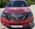 Красный Киа Соренто, объемом двигателя 2.5 л и пробегом 260 тыс. км за 8200 $, фото 1 на Automoto.ua