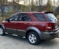 Красный Киа Соренто, объемом двигателя 2.5 л и пробегом 200 тыс. км за 3150 $, фото 2 на Automoto.ua