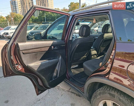 Красный Киа Соренто, объемом двигателя 2.4 л и пробегом 312 тыс. км за 10490 $, фото 12 на Automoto.ua