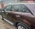 Красный Киа Соренто, объемом двигателя 2.4 л и пробегом 179 тыс. км за 12600 $, фото 1 на Automoto.ua