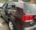Красный Киа Соренто, объемом двигателя 2.36 л и пробегом 270 тыс. км за 11000 $, фото 2 на Automoto.ua