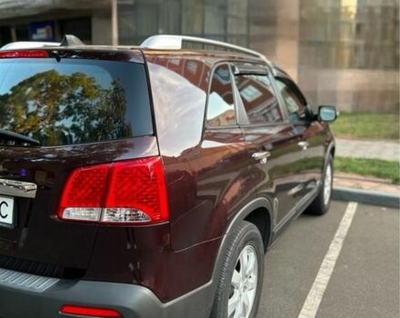 Червоний Кіа Соренто, об'ємом двигуна 2.4 л та пробігом 205 тис. км за 11000 $, фото 1 на Automoto.ua