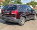 Красный Киа Соренто, объемом двигателя 2.4 л и пробегом 312 тыс. км за 10590 $, фото 6 на Automoto.ua