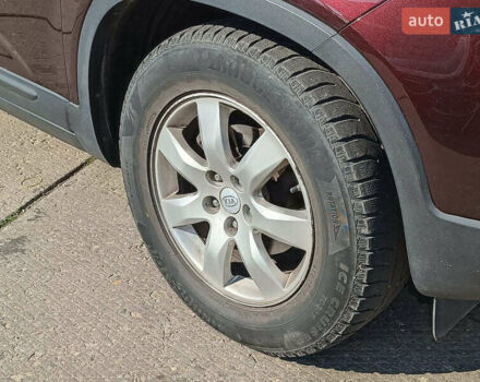 Красный Киа Соренто, объемом двигателя 2.4 л и пробегом 312 тыс. км за 10490 $, фото 5 на Automoto.ua