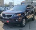 Красный Киа Соренто, объемом двигателя 2.4 л и пробегом 312 тыс. км за 10590 $, фото 1 на Automoto.ua