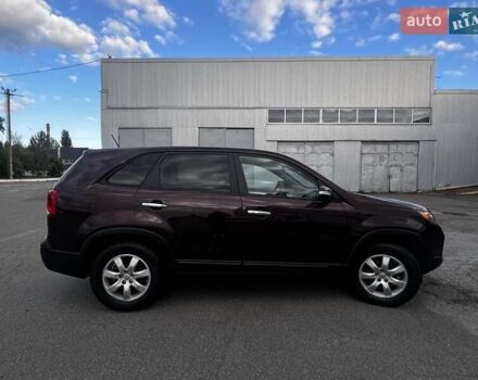 Красный Киа Соренто, объемом двигателя 2.36 л и пробегом 285 тыс. км за 12500 $, фото 3 на Automoto.ua