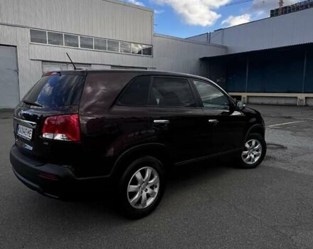 Красный Киа Соренто, объемом двигателя 2.36 л и пробегом 285 тыс. км за 12500 $, фото 4 на Automoto.ua