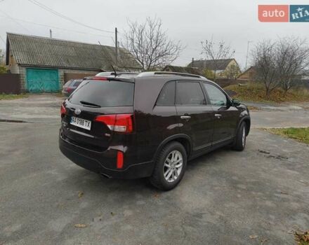 Красный Киа Соренто, объемом двигателя 2.36 л и пробегом 200 тыс. км за 12500 $, фото 4 на Automoto.ua