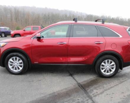 Красный Киа Соренто, объемом двигателя 2.4 л и пробегом 59 тыс. км за 6400 $, фото 4 на Automoto.ua