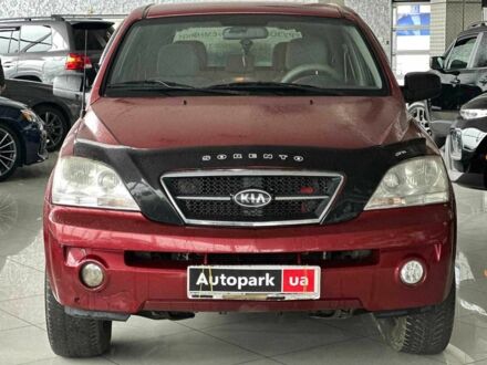 Красный Киа Соренто, объемом двигателя 2.4 л и пробегом 203 тыс. км за 6440 $, фото 1 на Automoto.ua