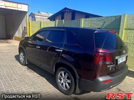 Червоний Кіа Соренто, об'ємом двигуна 2.4 л та пробігом 305 тис. км за 11200 $, фото 1 на Automoto.ua