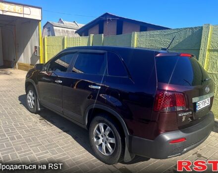 Красный Киа Соренто, объемом двигателя 2.4 л и пробегом 305 тыс. км за 11200 $, фото 1 на Automoto.ua