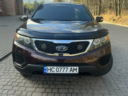 Красный Киа Соренто, объемом двигателя 2.36 л и пробегом 249 тыс. км за 9999 $, фото 1 на Automoto.ua
