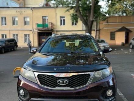 Червоний Кіа Соренто, об'ємом двигуна 2.4 л та пробігом 205 тис. км за 11000 $, фото 1 на Automoto.ua