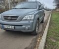 Серый Киа Соренто, объемом двигателя 2.4 л и пробегом 260 тыс. км за 4500 $, фото 1 на Automoto.ua
