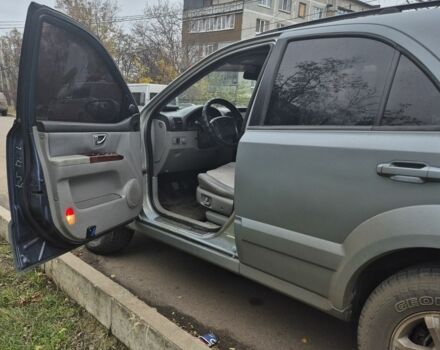 Серый Киа Соренто, объемом двигателя 2.4 л и пробегом 260 тыс. км за 4500 $, фото 4 на Automoto.ua