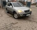 Серый Киа Соренто, объемом двигателя 2.4 л и пробегом 247 тыс. км за 5200 $, фото 1 на Automoto.ua