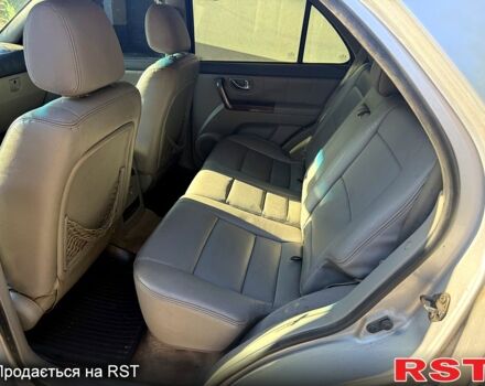 Серый Киа Соренто, объемом двигателя 2.4 л и пробегом 200 тыс. км за 3000 $, фото 7 на Automoto.ua