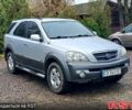 Серый Киа Соренто, объемом двигателя 2.4 л и пробегом 400 тыс. км за 5750 $, фото 2 на Automoto.ua