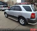 Серый Киа Соренто, объемом двигателя 2.5 л и пробегом 258 тыс. км за 7500 $, фото 3 на Automoto.ua