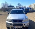 Серый Киа Соренто, объемом двигателя 2.4 л и пробегом 300 тыс. км за 5100 $, фото 1 на Automoto.ua