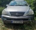 Серый Киа Соренто, объемом двигателя 2.5 л и пробегом 293 тыс. км за 3500 $, фото 1 на Automoto.ua