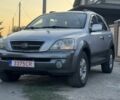 Серый Киа Соренто, объемом двигателя 2.5 л и пробегом 200 тыс. км за 4600 $, фото 1 на Automoto.ua