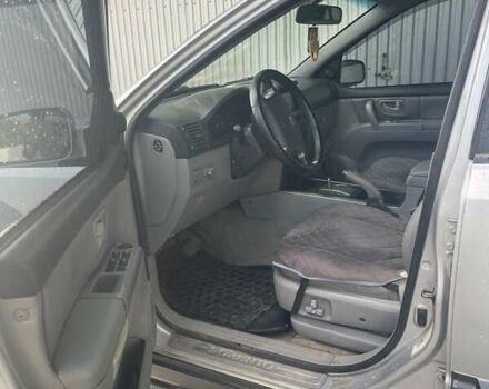 Серый Киа Соренто, объемом двигателя 2.5 л и пробегом 282 тыс. км за 7100 $, фото 13 на Automoto.ua