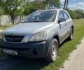 Сірий Кіа Соренто, об'ємом двигуна 2.5 л та пробігом 304 тис. км за 3818 $, фото 1 на Automoto.ua