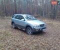 Серый Киа Соренто, объемом двигателя 2.4 л и пробегом 270 тыс. км за 7000 $, фото 2 на Automoto.ua