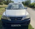Серый Киа Соренто, объемом двигателя 2.5 л и пробегом 304 тыс. км за 4582 $, фото 2 на Automoto.ua