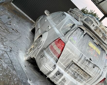 Серый Киа Соренто, объемом двигателя 2.5 л и пробегом 250 тыс. км за 20000 $, фото 2 на Automoto.ua