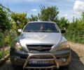 Серый Киа Соренто, объемом двигателя 2.5 л и пробегом 100 тыс. км за 3500 $, фото 1 на Automoto.ua