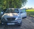 Серый Киа Соренто, объемом двигателя 2.5 л и пробегом 251 тыс. км за 7300 $, фото 1 на Automoto.ua