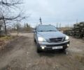 Сірий Кіа Соренто, об'ємом двигуна 2.5 л та пробігом 186 тис. км за 4950 $, фото 1 на Automoto.ua