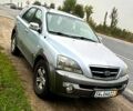 Серый Киа Соренто, объемом двигателя 2.5 л и пробегом 255 тыс. км за 4599 $, фото 1 на Automoto.ua