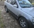 Серый Киа Соренто, объемом двигателя 2.5 л и пробегом 230 тыс. км за 4200 $, фото 3 на Automoto.ua