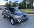 Серый Киа Соренто, объемом двигателя 2.5 л и пробегом 280 тыс. км за 4200 $, фото 1 на Automoto.ua