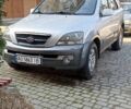 Серый Киа Соренто, объемом двигателя 2.5 л и пробегом 230 тыс. км за 5200 $, фото 1 на Automoto.ua