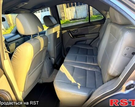 Серый Киа Соренто, объемом двигателя 2.5 л и пробегом 233 тыс. км за 4400 $, фото 5 на Automoto.ua