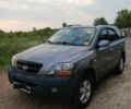 Серый Киа Соренто, объемом двигателя 2.5 л и пробегом 290 тыс. км за 9000 $, фото 1 на Automoto.ua