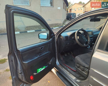 Серый Киа Соренто, объемом двигателя 2.5 л и пробегом 290 тыс. км за 8500 $, фото 5 на Automoto.ua