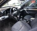 Серый Киа Соренто, объемом двигателя 2.4 л и пробегом 203 тыс. км за 11499 $, фото 3 на Automoto.ua