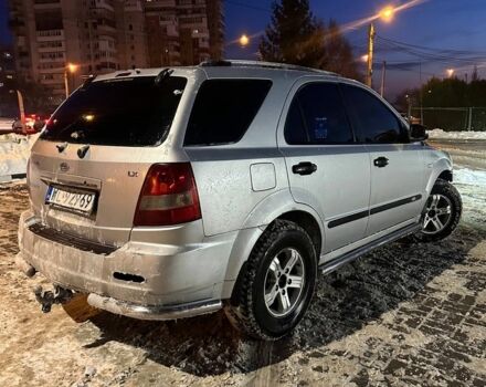 Серый Киа Соренто, объемом двигателя 2.5 л и пробегом 300 тыс. км за 2600 $, фото 1 на Automoto.ua