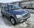 Синій Кіа Соренто, об'ємом двигуна 2.5 л та пробігом 300 тис. км за 3800 $, фото 1 на Automoto.ua