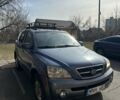 Синий Киа Соренто, объемом двигателя 2.5 л и пробегом 310 тыс. км за 4000 $, фото 1 на Automoto.ua