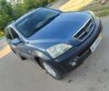 Синий Киа Соренто, объемом двигателя 2.5 л и пробегом 300 тыс. км за 3600 $, фото 1 на Automoto.ua