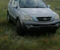 Синий Киа Соренто, объемом двигателя 2.5 л и пробегом 280 тыс. км за 4200 $, фото 1 на Automoto.ua
