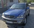 Синий Киа Соренто, объемом двигателя 2.4 л и пробегом 267 тыс. км за 6500 $, фото 1 на Automoto.ua