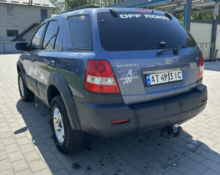Синий Киа Соренто, объемом двигателя 2.4 л и пробегом 240 тыс. км за 5100 $, фото 2 на Automoto.ua